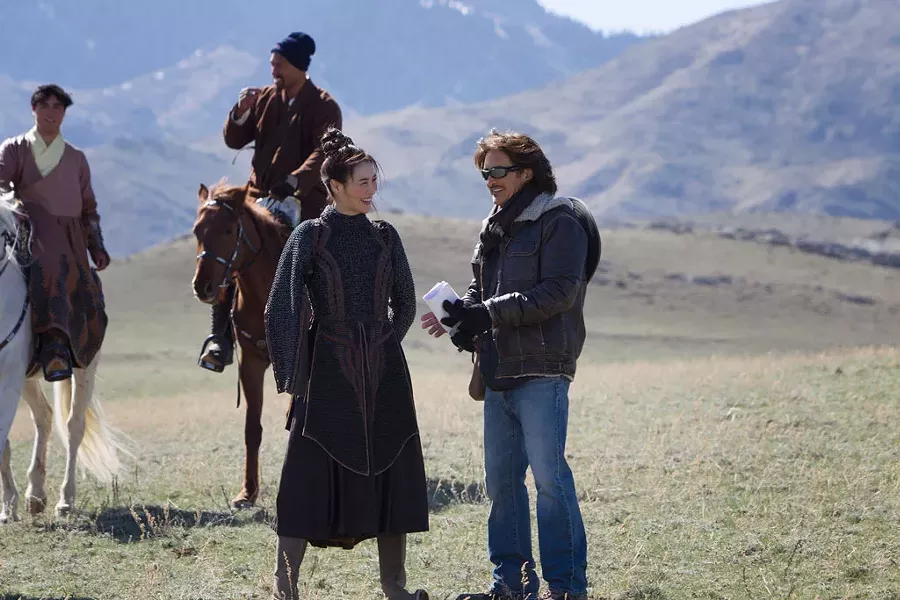 Claudia Kim (left) with John Fusco on the set of "Marco Polo" - COURTESY OF PHIL BRAY FOR NETFLIX