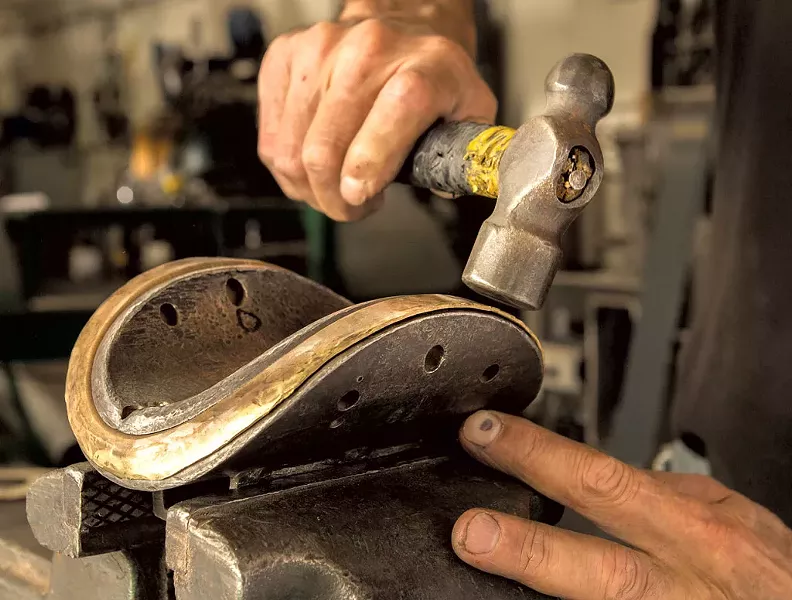 Custom shaping All Souls' brass tortilla cutter - COURTESY OF ALL SOULS TORTILLERIA