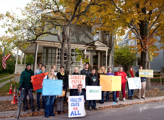 Demonstrators outside Broughton's Burlington home