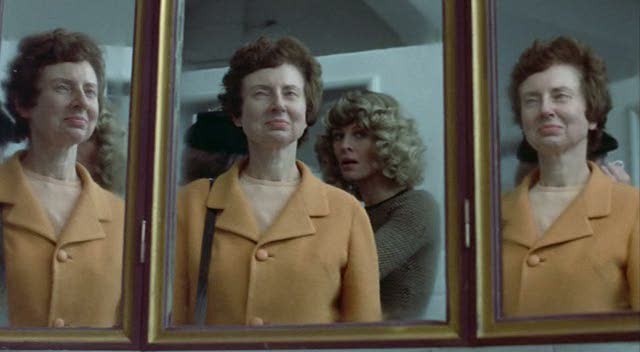 Don't Look Now complicates vision in many ways, as demonstrated by this multi-mirror shot. - PARAMOUNT PICTURES