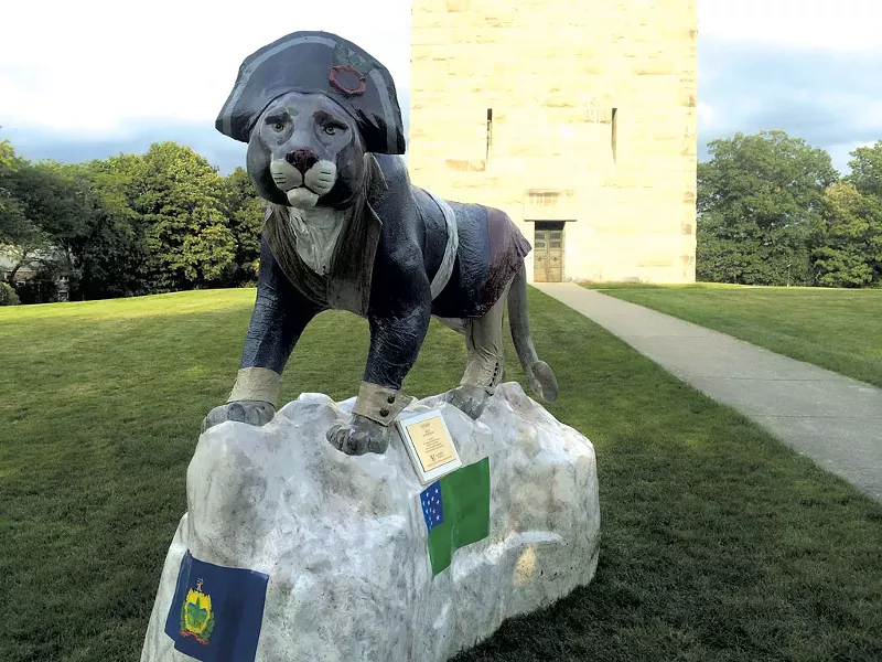 Ethan the catamount keeps watch at the Bennington Battle Monument - ALICE LEVITT