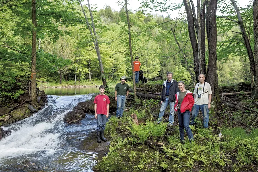 Friends of Gillett Pond from right to left: Bob Low, Nancy Stoddard, Dan Stoddard, Bridger (dog), Colin Low, Jon Low and Teagan Low - OLIVER PARINI