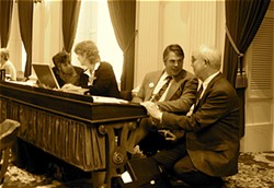 In this file photo from April 2007, then-majority whip Nease (second from right) chats with Rep. Bill Lippert (D-Hinesburg). - FILE: PETER FREYNE