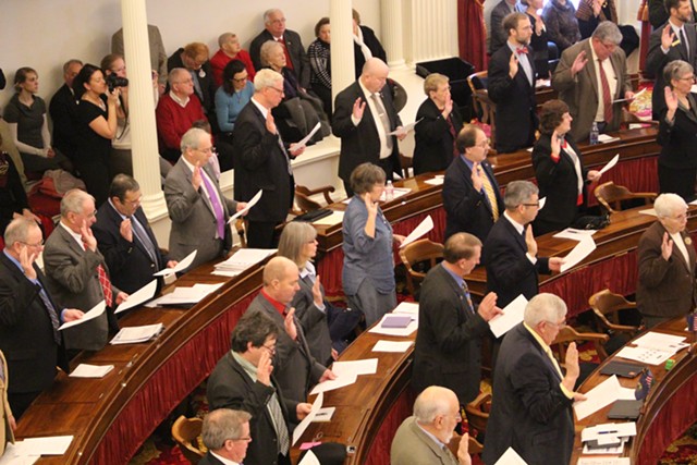 House members swear the oath of office. - PAUL HEINTZ