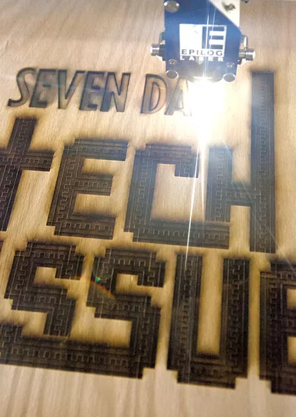 Matt Flego of Burlington’s Generator maker space used a laser cutter to burn this week's Seven Days cover into a piece of wood. - MATTHEW THORSEN