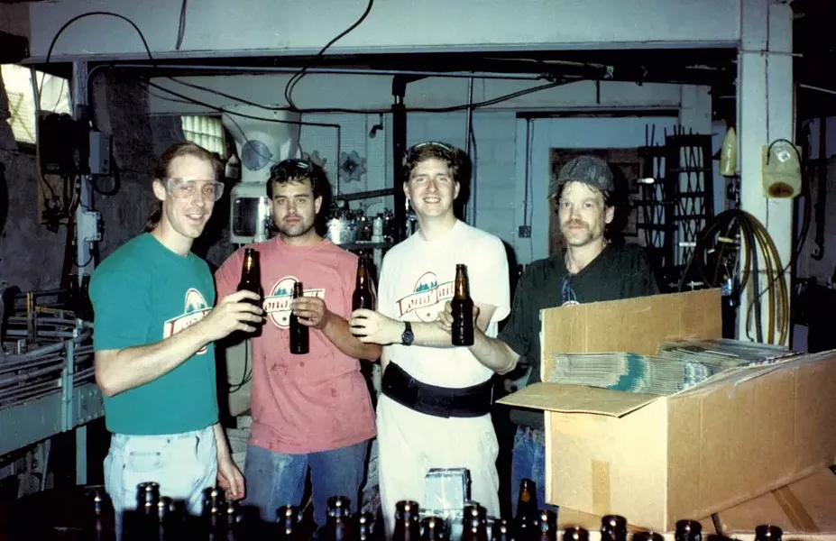Matt Quinlan (left), and Billy Gualt with former Mountain Brewers employees, mid-1990s - PHOTOS COURTESY OF LONG TRAIL BREWING CO.