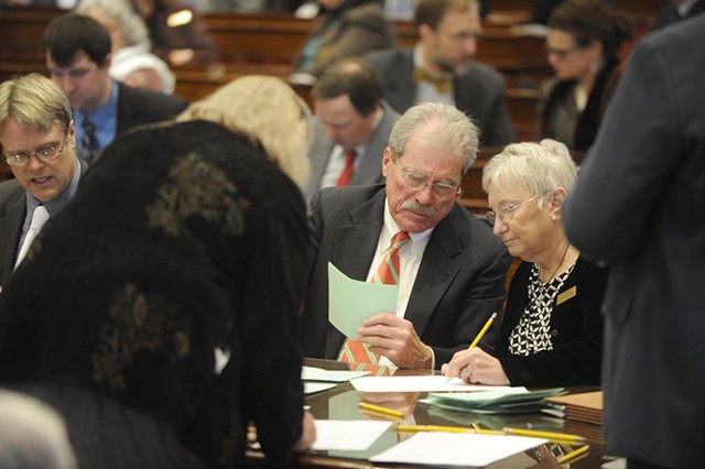 Members of the legislature's canvassing committee tally ballots. - JEB WALLACE-BRODEUR