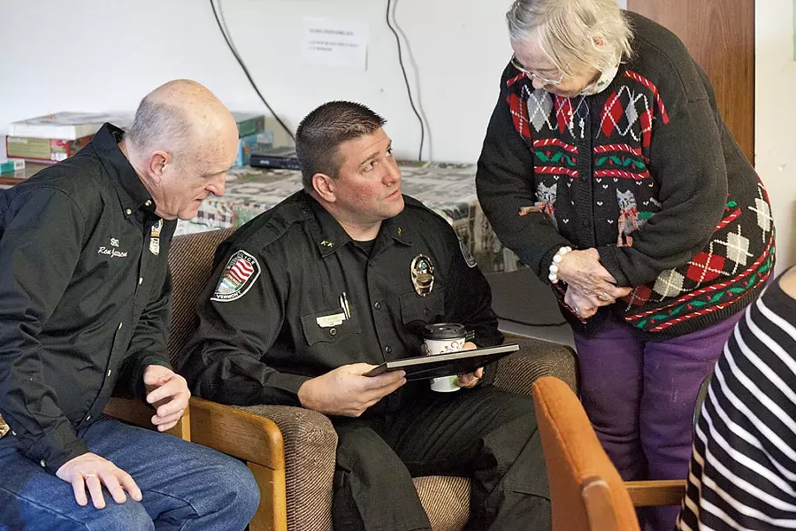 Officer Ron Jackson and Police chief Rick Hebert with Luella Murton at the Coffee With a Cop gathering at the Spring Gardens senior home - MATTHEW THORSEN