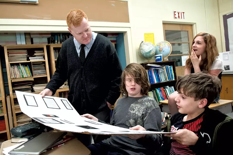 Principal Chris Smith checks in with his son Quinn Smith and Michael Boudreau at Readsboro
