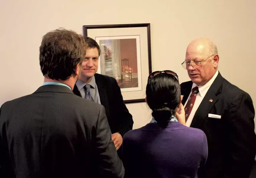 Rep. Sam Young, Secretary of Civil and Military Affairs Louis Porter, Rep. Kesha Ram and Sen. Norm McAllister at a Downs Rachlin Martin open house in April - COURTESY OF PAUL HEINTZ