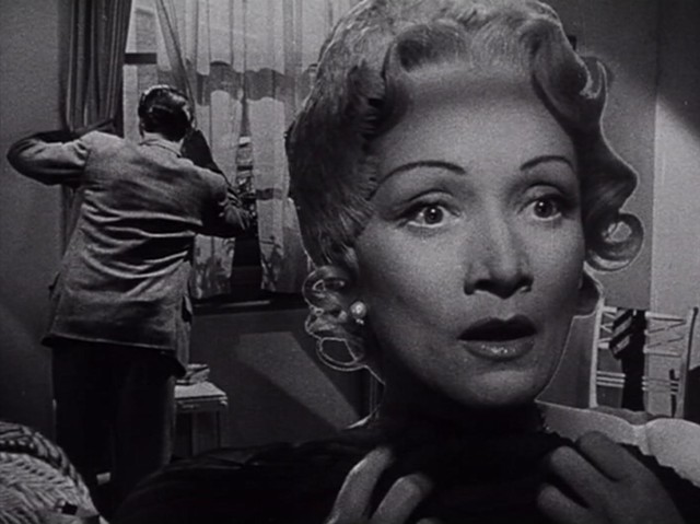 Richard Todd and Marlene Dietrich in the famous matte shot from Stage Fright - WARNER BROS. PICTURES