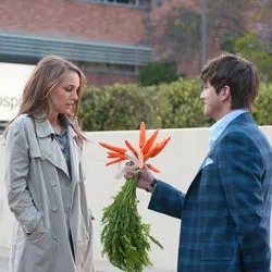 ROOTING FOR ROMANCE Kutcher offers his “sex friend” Portman an appropriate bouquet in Reitman’s romantic comedy.