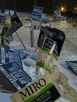Campaign signs outside a polling station - MATTHEW THORSEN