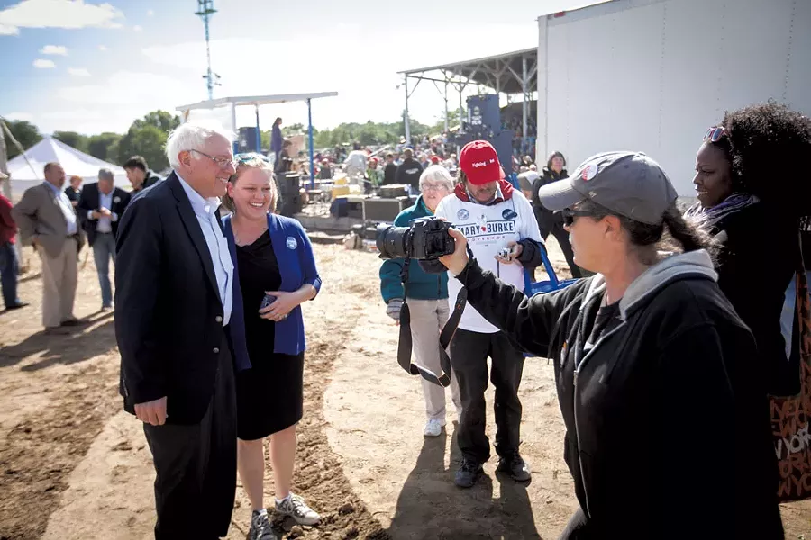 Sanders poses with Wisconsin congressional candidate Kelly Westlund - ERIC TADSEN