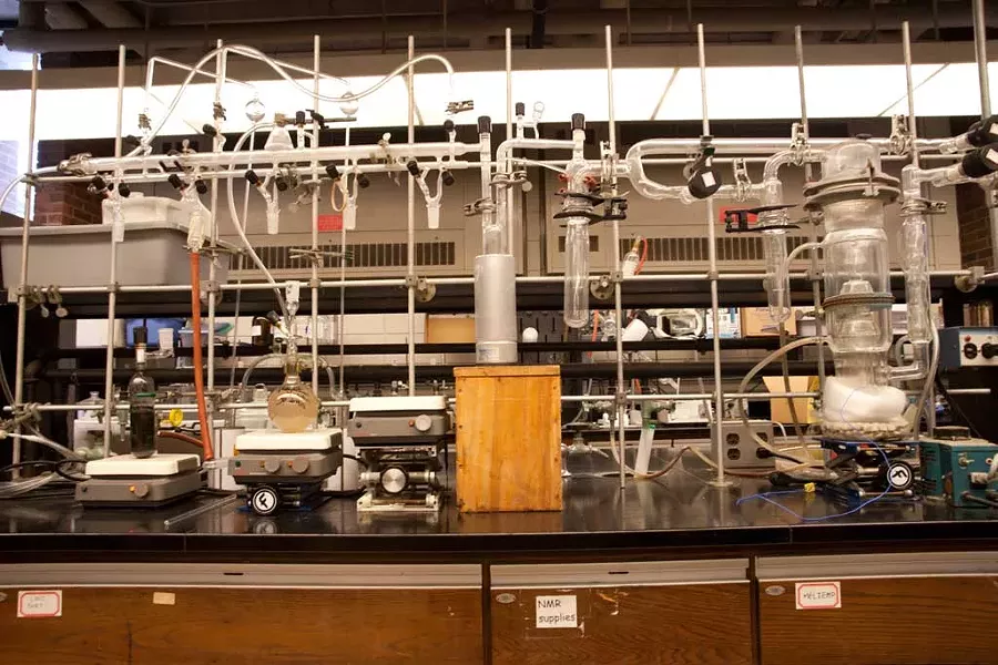 Schlenk vacuum line, left; oil diffusion pump, right - MATTHEW THORSEN