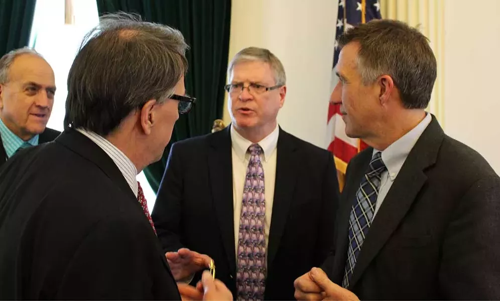 Sen. Peter Galbraith, Sen. John Campbell and Lt. Gov. Phil Scott conference on the Senate floor. - COURTESY OF PAUL HEINTZ
