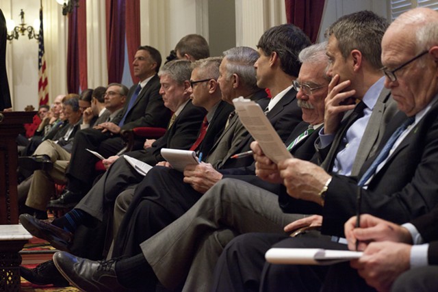 Vermont senators listen to Gov. Peter Shumlin's budget address. - MATTHEW THORSEN