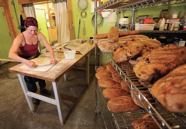 Suzanne Slomin makes pizza dough at Kingsbury Market Garden Bakery in Warren - JEB WALLACE-BRODEUR