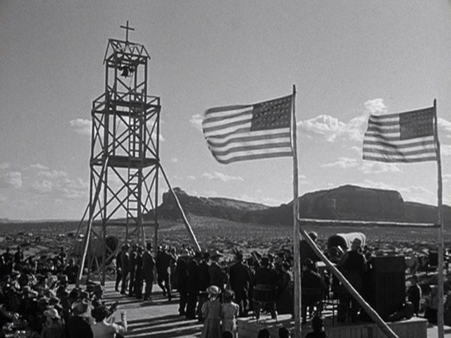 The integration of the natural landscape, the church's architecture, and two flags. - TWENTIETH CENTURY FOX PICTURES