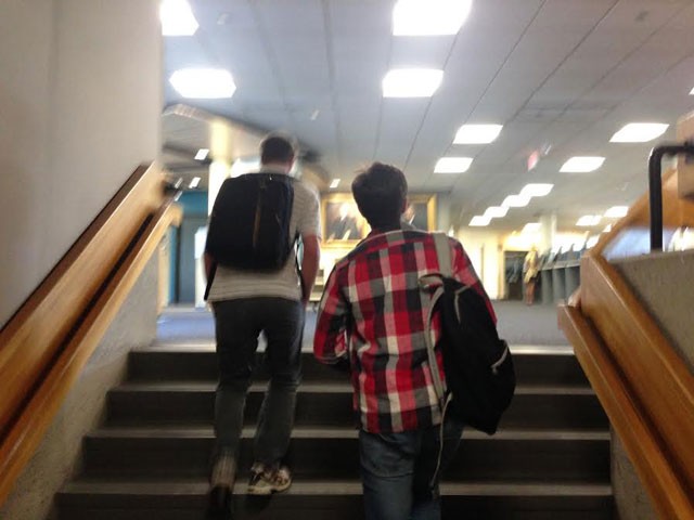 The two mystery men pictured leaving Bailey/Howe Library last Thursday afternoon - PAUL HEINTZ