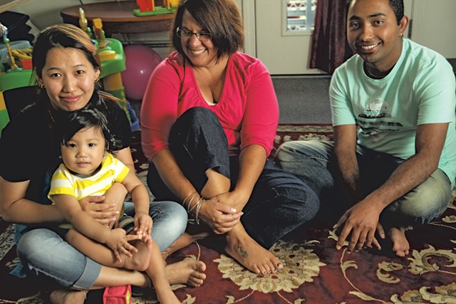 Chandra Bharati; her son, Aaron; Ellen Drolette; and interpreter  Prem Bhattarai at Bharati's home* - MATTHEW THORSEN