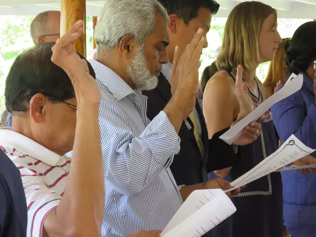 New citizens take the Oath of Allegiance in Shelburne - MATTHEW THORSEN