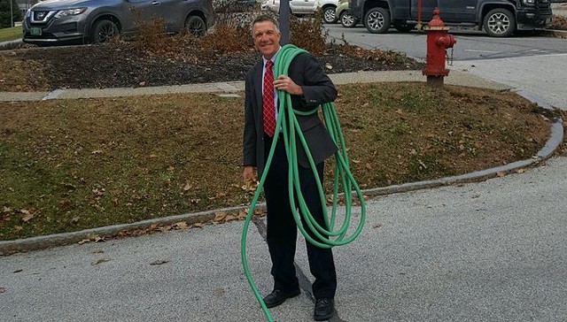 Gov. Phil Scott poses with his hose - COURTESY: GOV. PHIL SCOTT ADMINISTRATION