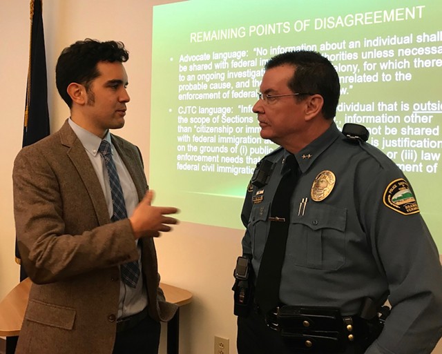 Jay Diaz, a staff attorney for the Vermont chapter of the American Civil Liberties Union, speaks with Brandon Police Chief Christopher Brickell. - TAYLOR DOBBS