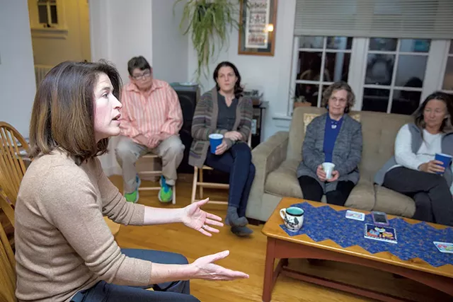 Carina Driscoll meeting community members at a house party - JAMES BUCK