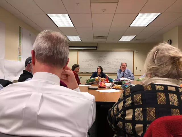 Senate Democrats meeting in the basement of a state office building. - ALICIA FREESE