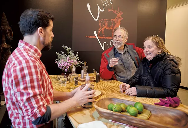 Craig Stevens (left) talking with customers - BEAR CIERI