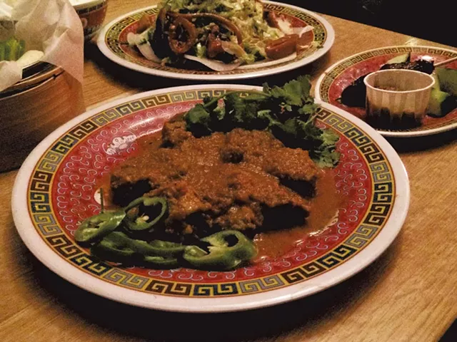 Smoked octopus salad, beef satay and lamb kamouraska korma at Satay Brothers - MOLLY ZAPP