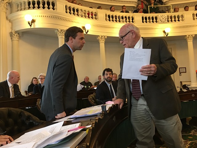 Senate President Pro Tempore Tim Ashe consulting with Sen. Dick Sears during a recess in the S.55 debate - JOHN WALTERS