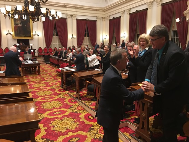 After his adjournment speech to the House, Gov. Phil Scott pauses for a handshake with House Minority Leader Don Turner. - JOHN WALTERS