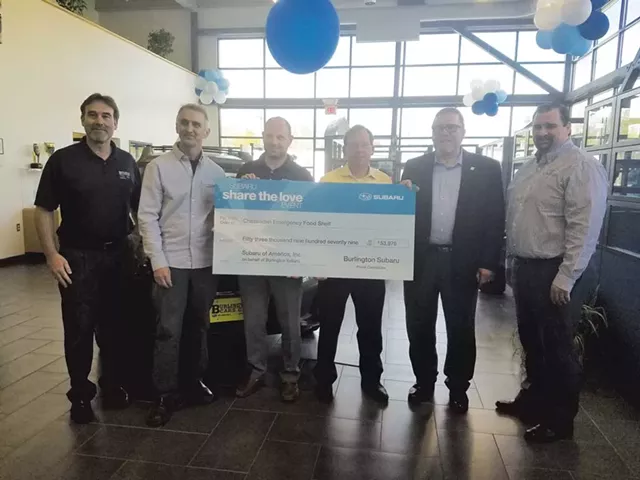 Chittenden Emergency Food Shelf receiving the check - SALLY POLLAK