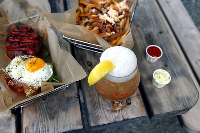 Parmesan truffle fries, Worthy Burger with egg and blue cheese, and the John Daly cocktail - SARAH PRIESTAP