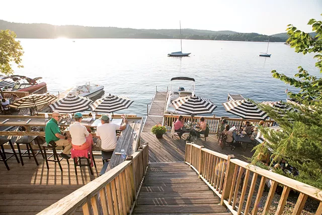 Outdoor dining at Lake House Pub & Grill - CALEB KENNA