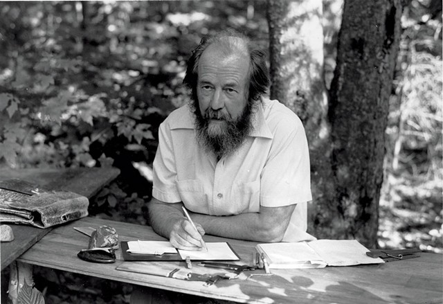 Solzhenitsyn in Cavendish, at his self-made table with birch legs. - COURTESY OF THE ALEKSANDR SOLZHENITSYN CENTER.