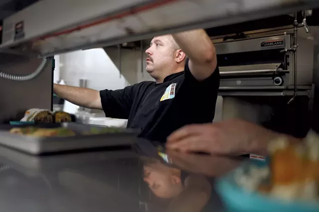 Chef Dennis Marcoux in the kitchen - SARAH PRIESTAP