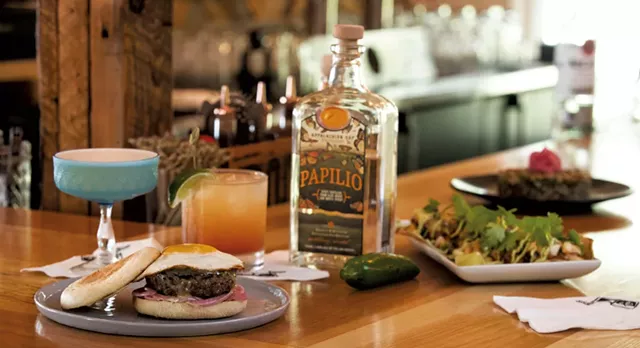Amy's Wild Hart cocktail, Spicy Paloma Sunrise cocktail, P&T Burger, cajun shrimp tacos, and pearl pesto couscous - JAMES BUCK