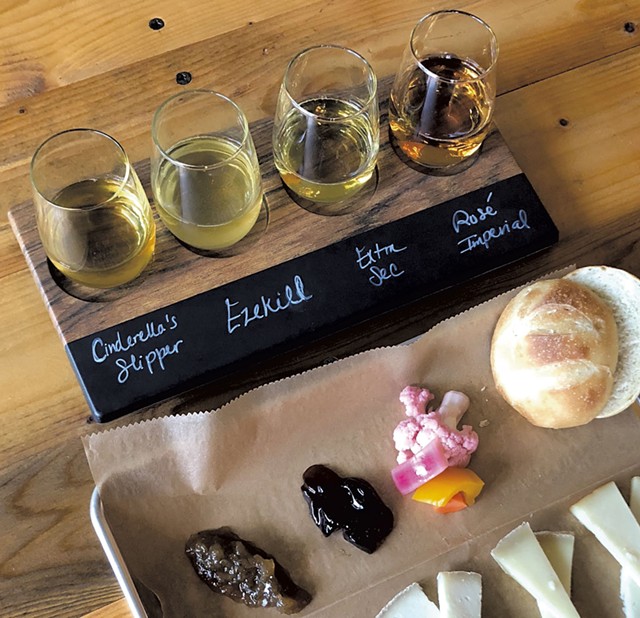 Eden Specialty Ciders flight with cheese - COURTESY OF EDEN SPECIALTY CIDERS
