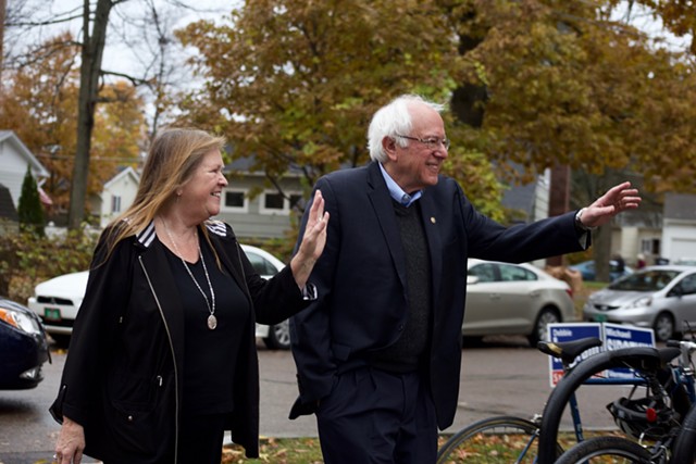 Sen. Bernie Sanders and his wife, Jane O'Meara Sanders, arrive to vote in Burlington - SOPHIE MACMILLAN
