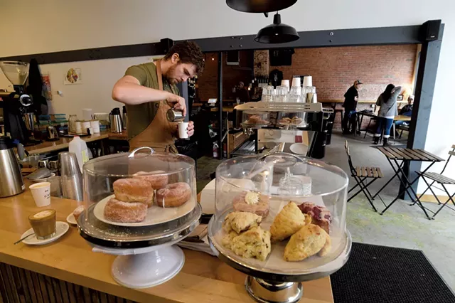 Nate Doyon working the counter at Carrier Roasting - JEB WALLACE-BRODEUR