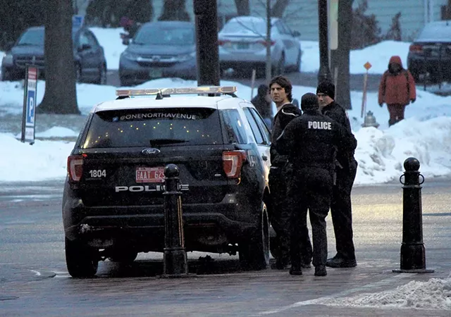 Good Times owner Derek Spilman being detained by Burlington Police - PAUL HEINTZ