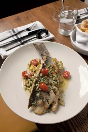 Branzino with grilled artichoke caponata - CALEB KENNA