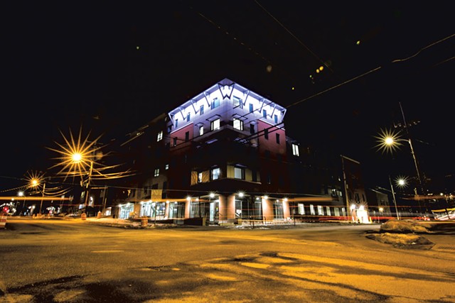 At night, fa&Ccedil;ade lighting accentuates architectural details on the building - LUKE AWTRY
