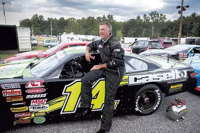 Then-lieutenant governor Phil Scott in August 2016, when Casella sponsored his racecar - FILE: JAMES BUCK