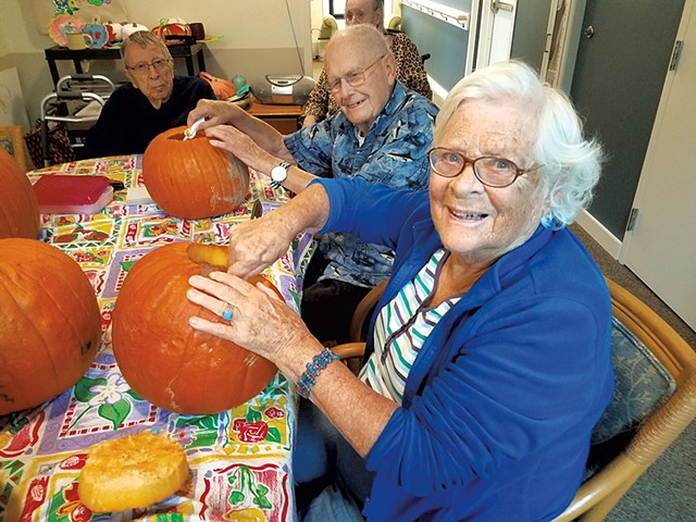 Carving pumpkins - COURTESY OF THE LIVING WELL GROUP