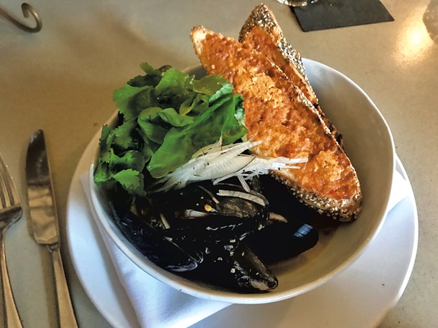 Mussels and grilled bread with kimchi butter at Kismet - CHELSEA EDGAR