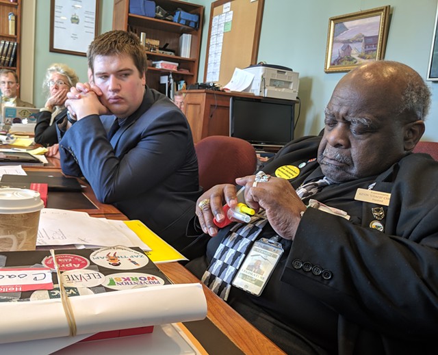 Rep. Kevin Christie (D-Hartford) inspecting a saliva testing device in the House Judiciary Committee - TAYLOR DOBBS